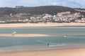 View of a professionals sports practicing extreme sports Kite-boarding at the Obidos lagoon