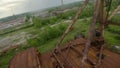 FPV drone flies maneuverable near abandoned huge escalator