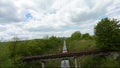 FPV drone flies quickly and maneuverable near a moving freight train