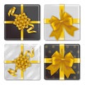 Set of gift boxes tied with golden ribbons, with white and black wrapping Royalty Free Stock Photo