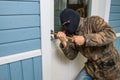 Fractional man breaking into a residential building in Finland.