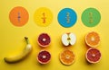 Fractions depicted with colorful circles and fruit sections. Banana apple and oranges represent a visual learning tool. Royalty Free Stock Photo
