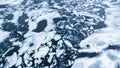 Fractured shelf ice on open water from a glacier