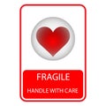 Heart symbol in a globe with the text fragile handle with care Royalty Free Stock Photo