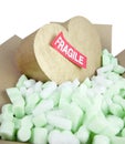 Fragile heart with sticker Royalty Free Stock Photo