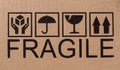 Fragile icons on cardboard