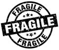 Fragile round grunge stamp