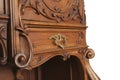 A fragment of an ancient carved furniture closeup isolated on a Royalty Free Stock Photo