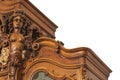 A fragment of an ancient carved furniture closeup isolated on a Royalty Free Stock Photo