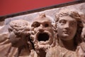 Fragment of ancient Roman marble high relief, close-up