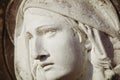 Fragment of ancient statue of Virgin Mary in profile. Religion, faith, Christianity concept Royalty Free Stock Photo