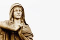 Fragment of ancient stone statue of Mary Magdalene praying. Faith, religion, God concept. Horizontal image