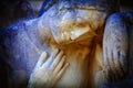 Fragment of an ancient stone statue of sad and desperate woman on tomb as a symbol of death and the end of human life. Horizontal