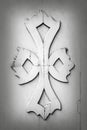 Fragment of ancient wooden door with embossed decoration in the form of cross Royalty Free Stock Photo