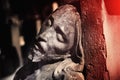 Fragment of antique statue the suffering of Jesus Christ. Close up of antique statue. Religion tradition Royalty Free Stock Photo