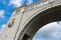 Fragment of arch of navigable sluice on background sky, Russia