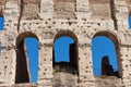 Fragment of arches of Colosseum or Coliseum Flavian Amphitheatre or Amphitheatrum Flavium or Anfiteatro Flavio or Colosseo. Oval Royalty Free Stock Photo