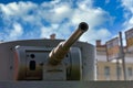 A fragment of an armored vehicle against background of a blurred bus stop sign