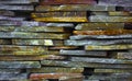 Fragment of artistic wall made with multiple stones Royalty Free Stock Photo