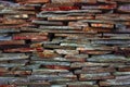 Fragment of artistic wall made with multiple stones Royalty Free Stock Photo