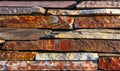 Fragment of artistic wall made with multiple stones Royalty Free Stock Photo