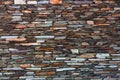 Fragment of artistic wall made with multiple stones Royalty Free Stock Photo