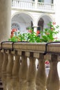 Fragment of balustrade in arched gallery of old building Royalty Free Stock Photo