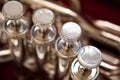 Fragment of a bass tuba valves Royalty Free Stock Photo