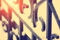 Fragment of a beautiful black iron fence. Close-up Royalty Free Stock Photo