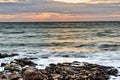 A fragment of the Black Sea against the background of a cloudy dawn Royalty Free Stock Photo