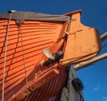 Fragment of the boat of the icebreaker -Krasin-. It is a ship-museum. Keel and propeller. The boat is painted orange Royalty Free Stock Photo