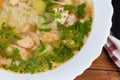 Fragment of bowl with clear salmon soup, top view Royalty Free Stock Photo
