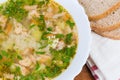 Fragment of bowl with clear salmon soup, top view Royalty Free Stock Photo