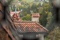 Fragment of the Bran Castle. View through the loophole of the grate in the window of the watchtower of the castle of Bran Castle. Royalty Free Stock Photo