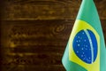 Fragment of the Brazilian flag in the foreground space for text blurred background Royalty Free Stock Photo