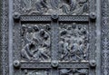 Fragment of Bremen`s Cathedral Metalic Door with religious decorations Royalty Free Stock Photo