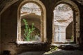 Fragment of brick building with two empty window.