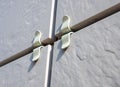 Fragment of a building cladding with ceramic tiles