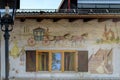Fragment of building facade with Lueftlmalerei mural paintings Bavarian three dimensional painted frescoes. Oberammergau,