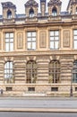 Fragment of the building of Louvre Museum. Paris, France