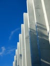 A fragment of a building, repeating concrete rectangular columns. Royalty Free Stock Photo