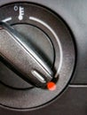 Fragment of car temperature controller in red area set at high values. Icon of temperature Royalty Free Stock Photo
