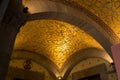 Fragment of a ceiling covered with golden mosaic and Byzantine eagle in Naples, Italy