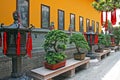 Fragment of Chinese Temple With Row Of Bonsai Trees Royalty Free Stock Photo