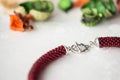 Fragment of choker necklace made from beads and beaded rope Royalty Free Stock Photo