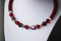 Fragment of choker necklace made from beads and beaded rope Royalty Free Stock Photo