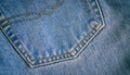 Fragment of classic blue fashioned jeans