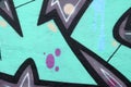 Fragment of colored street art graffiti paintings with contours and shading close up Royalty Free Stock Photo