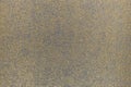 Fragment of colorful modern tapestry textile surface with golden texture
