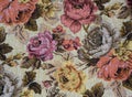 Fragment of colorful retro tapestry textile pattern with floral ornament useful as background Royalty Free Stock Photo